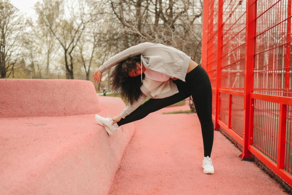 woman stretching sunrise