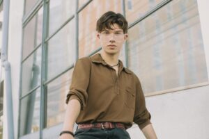 young Mick Jagger performing